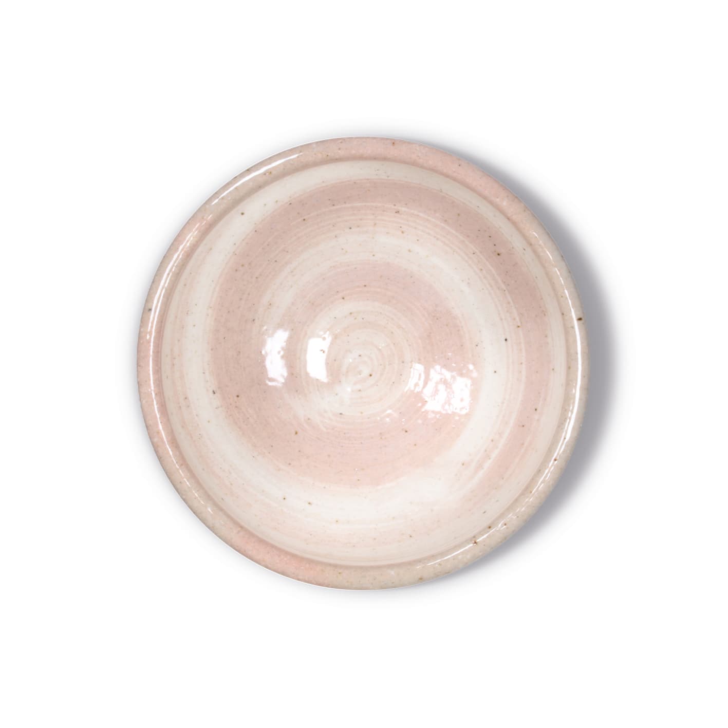 Eine rosa Matcha-Kāru-Schale auf einer weißen Oberfläche.